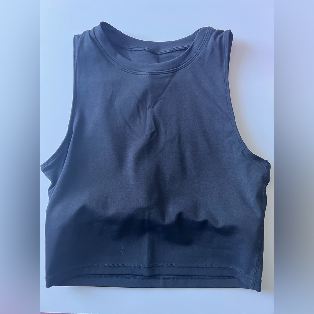Black cropped tank top from aura. Size small/medium.